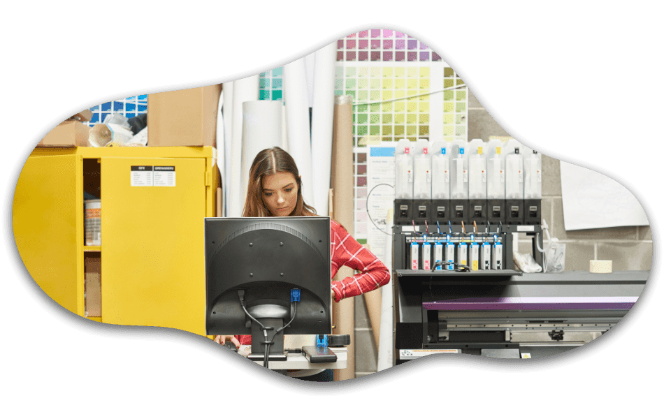 decorative image of print operator and digital printer in studio